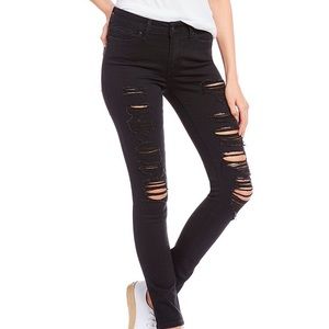 Levi’s 711 Black Distressed Skinny Jeans